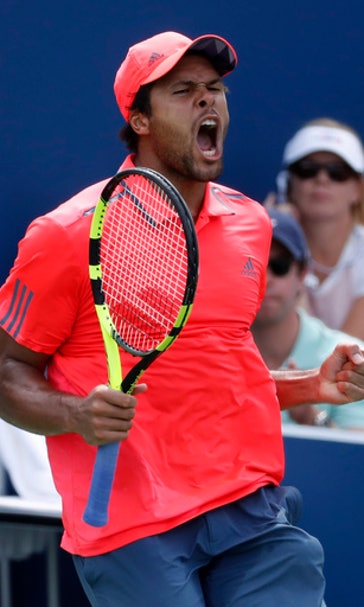 The Latest: Sock tops '14 champ Cilic to reach Open's 4th Rd